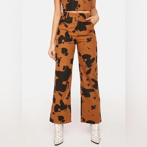 Pretty Garbage cow print denim cowboy cowgirl pants - size small 25-26” waist